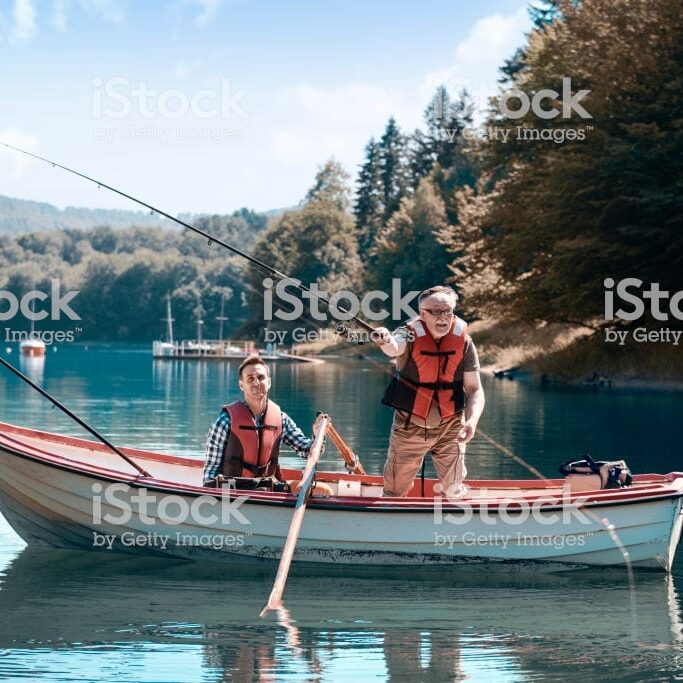Two men relaxing and fishing